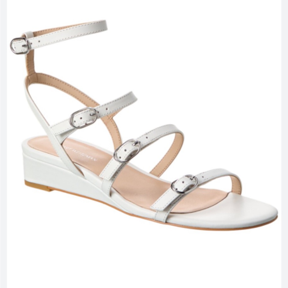 STUART WEITZMAN
Grecian Buckle Wedge
Sandal In White SIZE 9.5 
$450 NEW